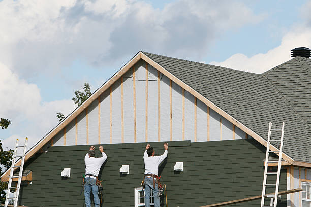 Professional Siding Installation technician working in New Paris, OH